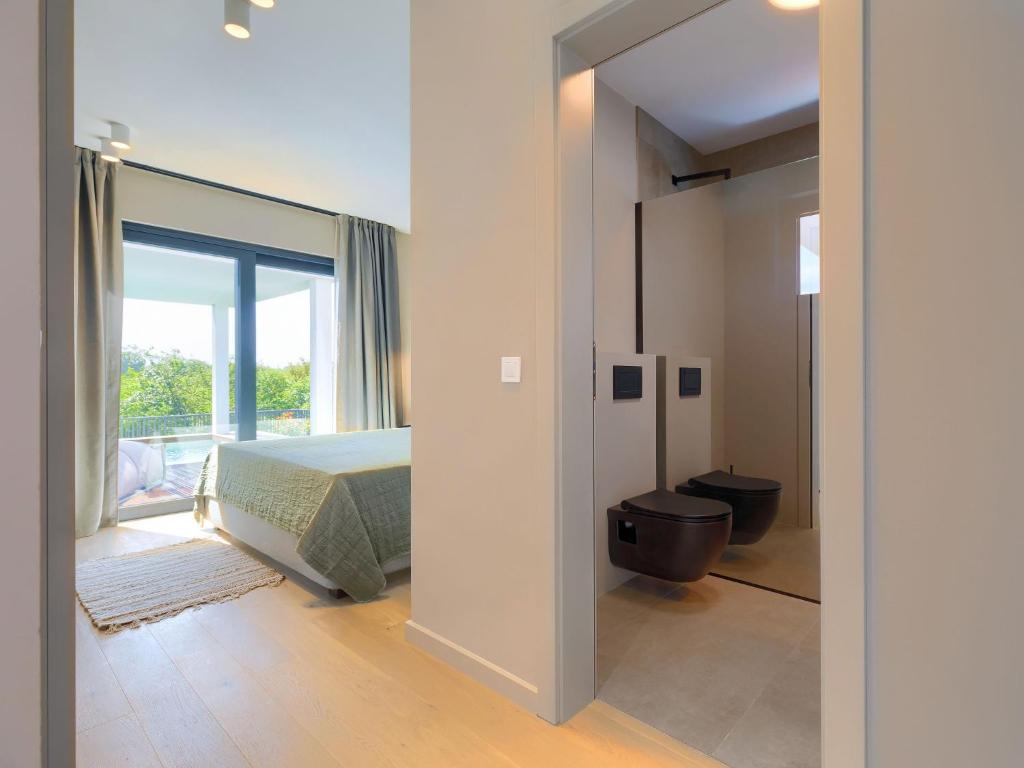 Posteľ alebo postele v izbe v ubytovaní Holiday Home Villa Valle by Interhome
