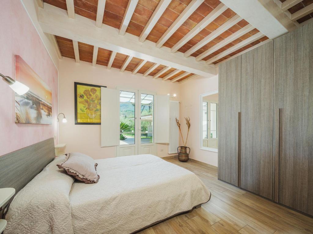 Posteľ alebo postele v izbe v ubytovaní Holiday Home Versilia Holiday by Interhome