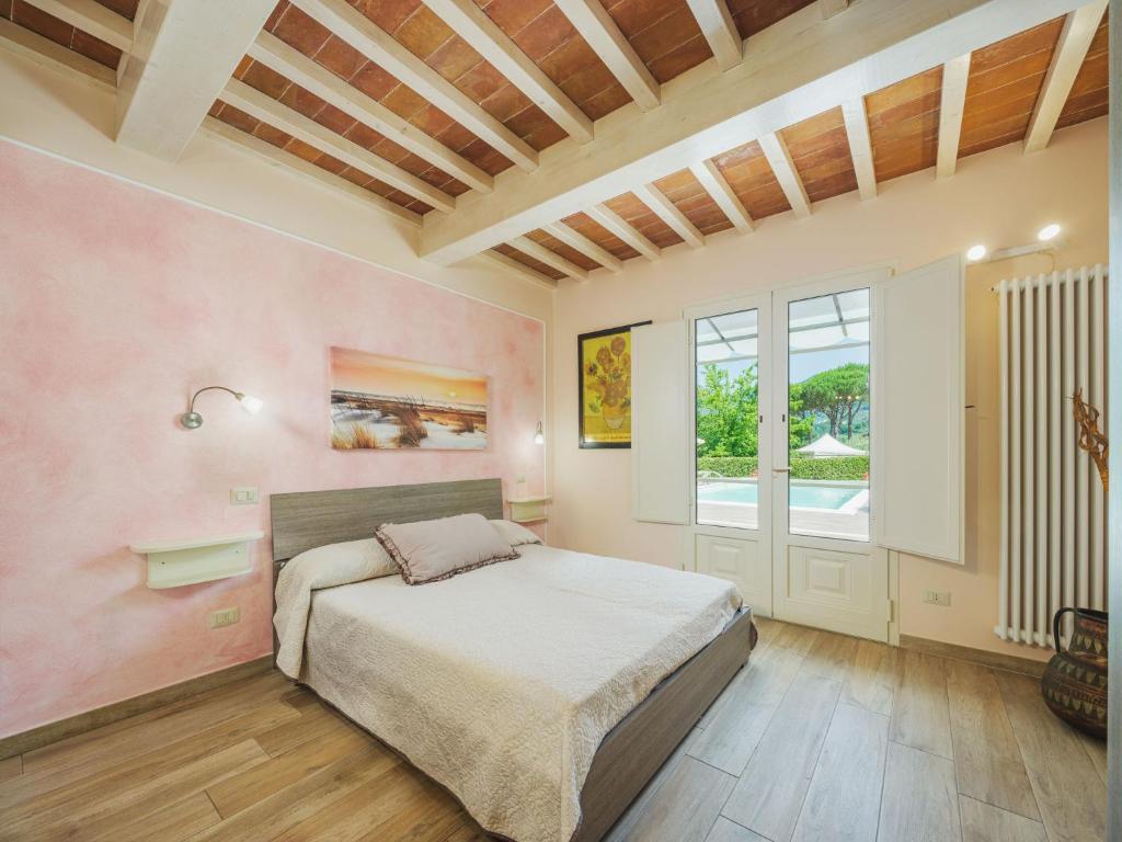 Posteľ alebo postele v izbe v ubytovaní Holiday Home Versilia Holiday by Interhome