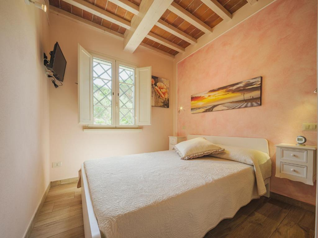 Posteľ alebo postele v izbe v ubytovaní Holiday Home Versilia Holiday by Interhome