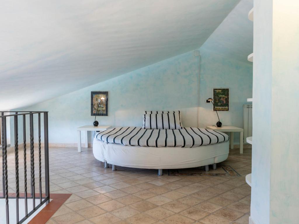 Łóżko lub łóżka w pokoju w obiekcie Villa Villa Bougainvillea by Interhome