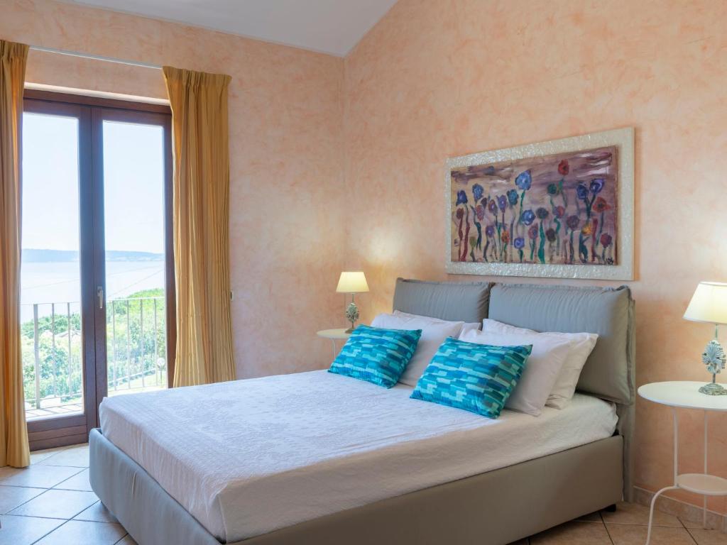 Łóżko lub łóżka w pokoju w obiekcie Villa Villa Bougainvillea by Interhome