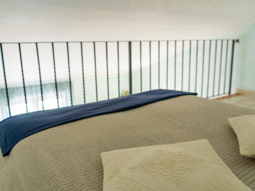 Łóżko lub łóżka w pokoju w obiekcie Villa Villa Bougainvillea by Interhome
