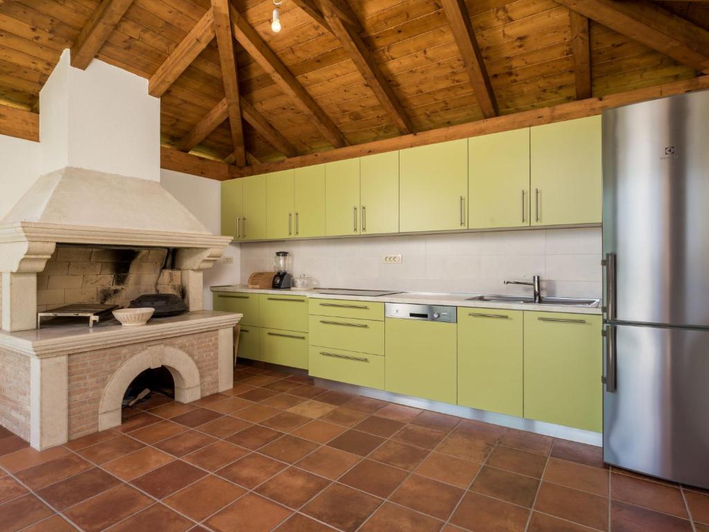 Kuchyň nebo kuchyňský kout v ubytování Holiday Home Villa Alpeza by Interhome