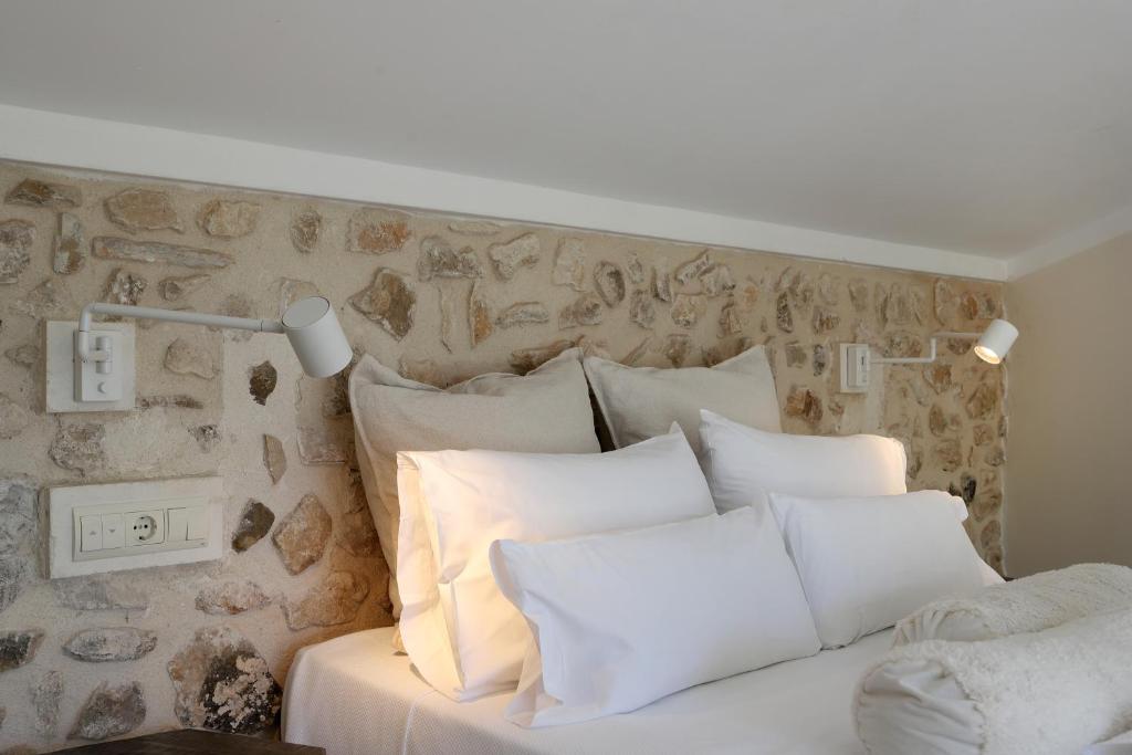 Postel nebo postele na pokoji v ubytování Nasilvana Hotel & Spa Adults Only