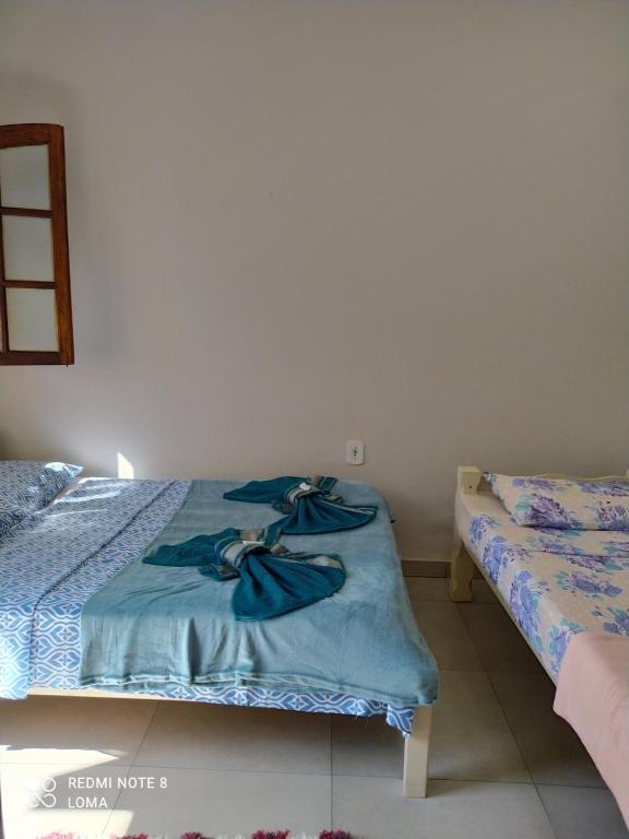 Postel nebo postele na pokoji v ubytování Pousada Exuberante