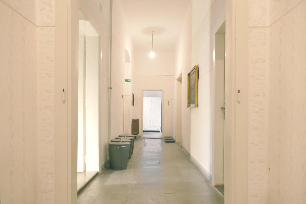 a hallway with a row of toilets in a building at Nezámek in Hartmanice