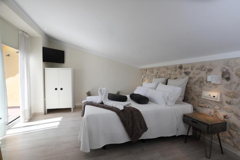 Postel nebo postele na pokoji v ubytování Nasilvana Hotel & Spa Adults Only