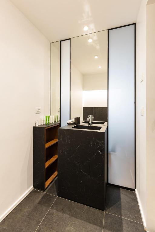 Kuchyň nebo kuchyňský kout v ubytování Hotel Casa Scaligeri