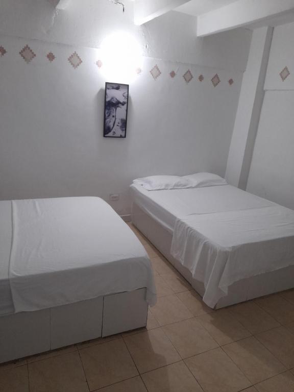 Voodi või voodid majutusasutuse Rivera Hostel toas