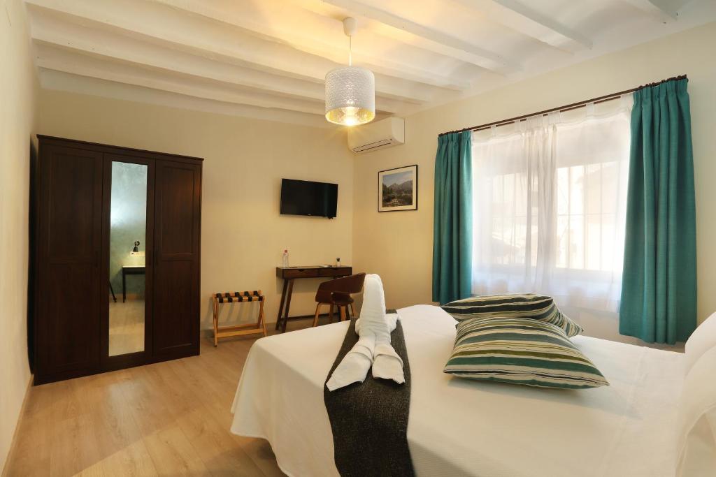 Postel nebo postele na pokoji v ubytování Nasilvana Hotel & Spa Adults Only