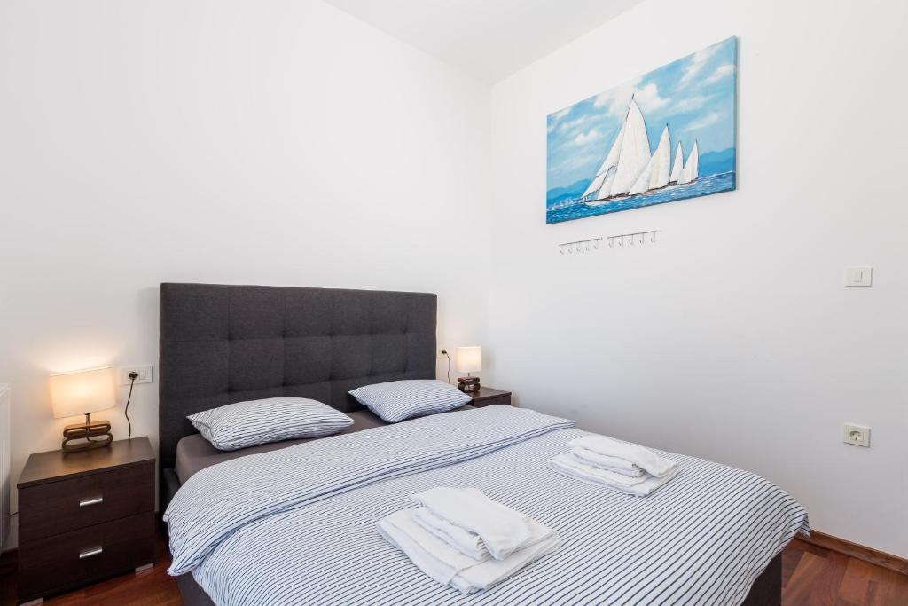 Posteľ alebo postele v izbe v ubytovaní Stella Premium Apartment Opatija
