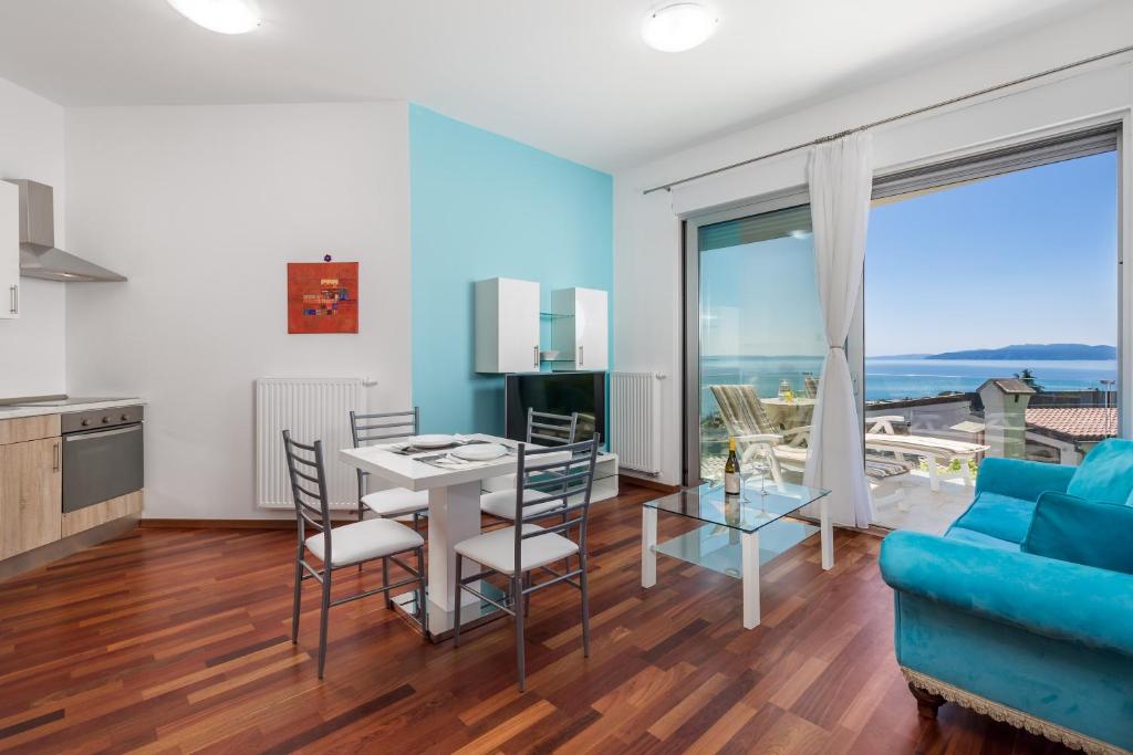 Televízia a/alebo spoločenská miestnosť v ubytovaní Stella Premium Apartment Opatija