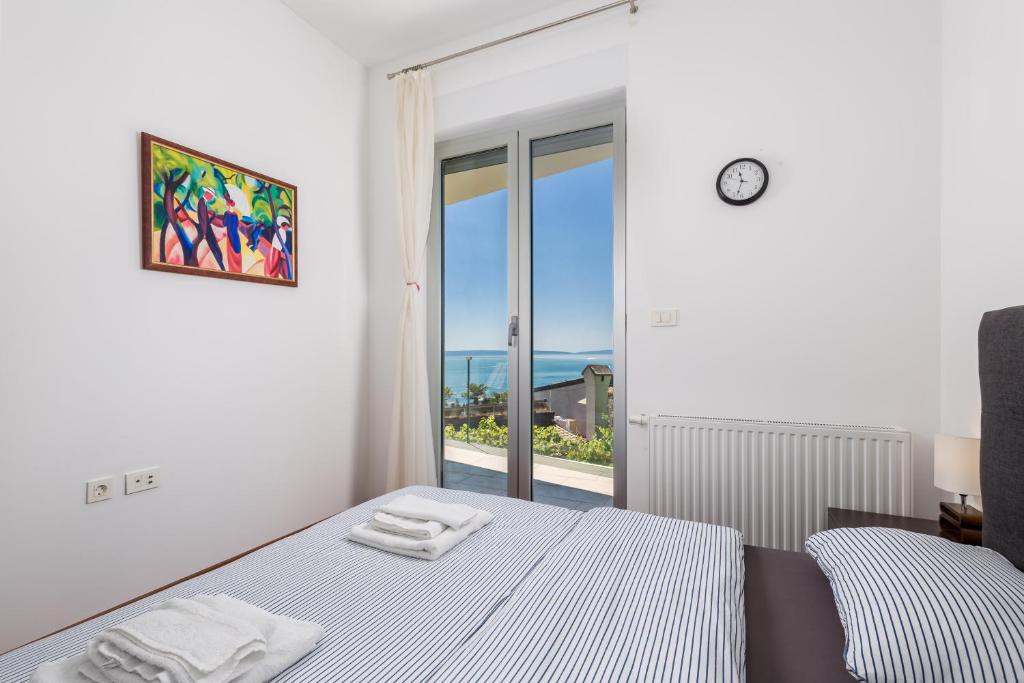 Posteľ alebo postele v izbe v ubytovaní Stella Premium Apartment Opatija
