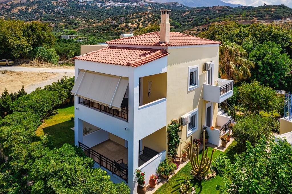 an aerial view of a house with a roof at Plakias River Apartment in Plakias