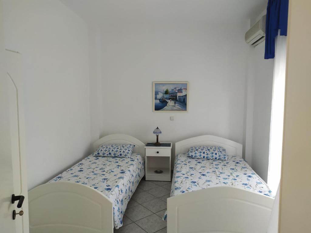 Postel nebo postele na pokoji v ubytování Panorama Apartments