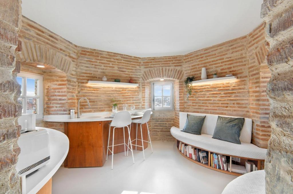 Kuchyňa alebo kuchynka v ubytovaní La Tour du Capitole, cocoon insolite dans Toulouse