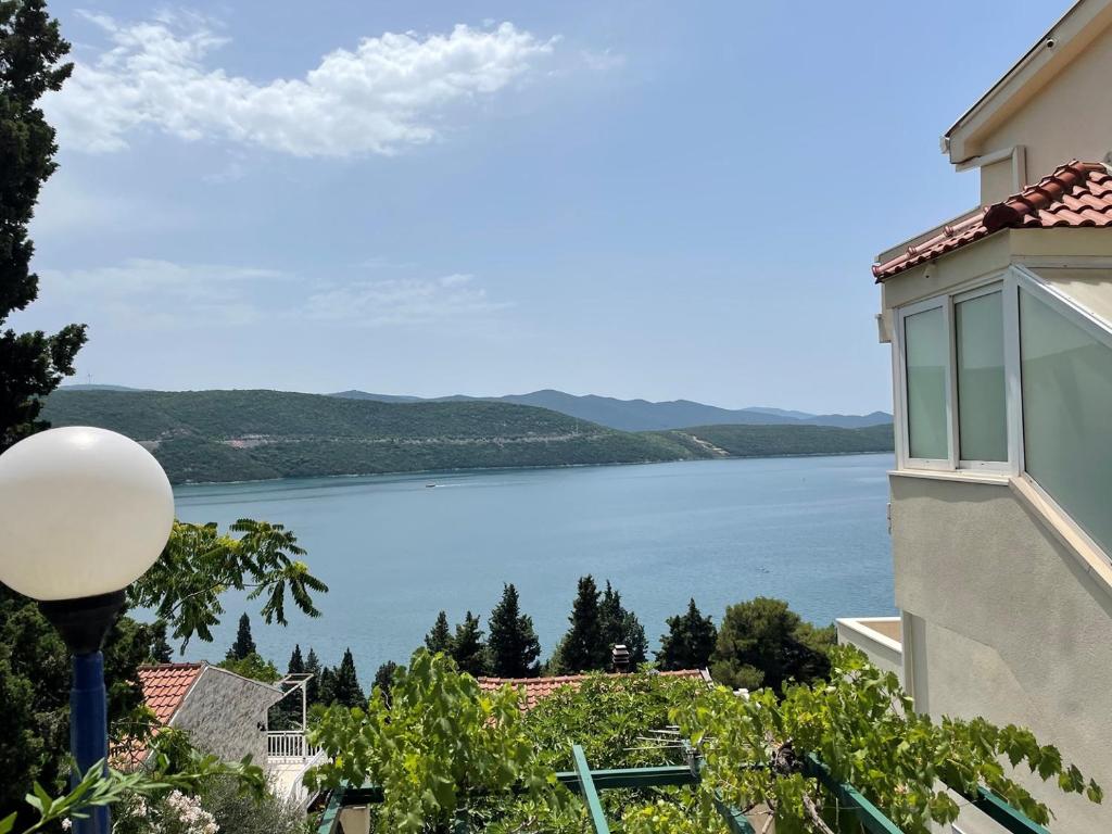 a view of a lake from a house at Holiday Home Blanka in Neum