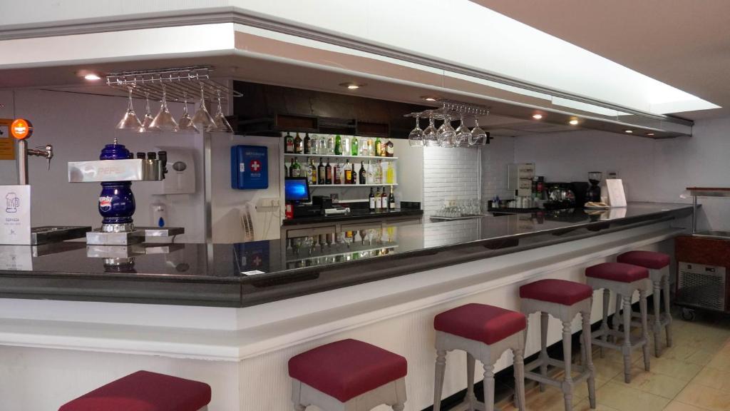 Lounge nebo bar v ubytování O7 Alea
