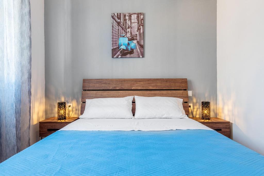 Postel nebo postele na pokoji v ubytování Casa Dapergola