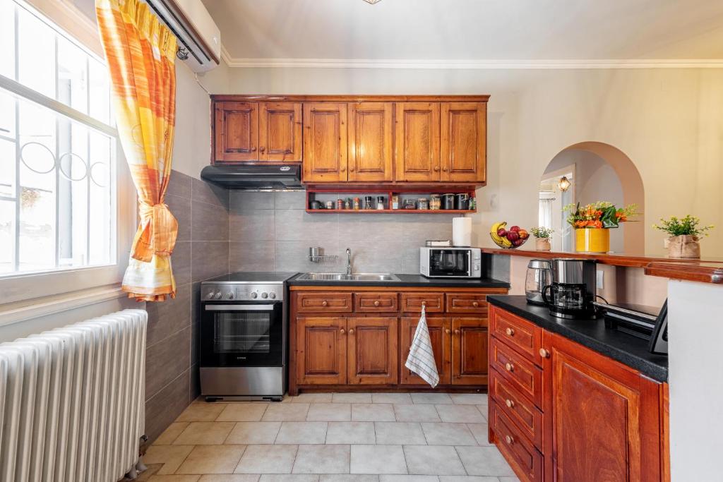 Kuchyň nebo kuchyňský kout v ubytování Casa Dapergola