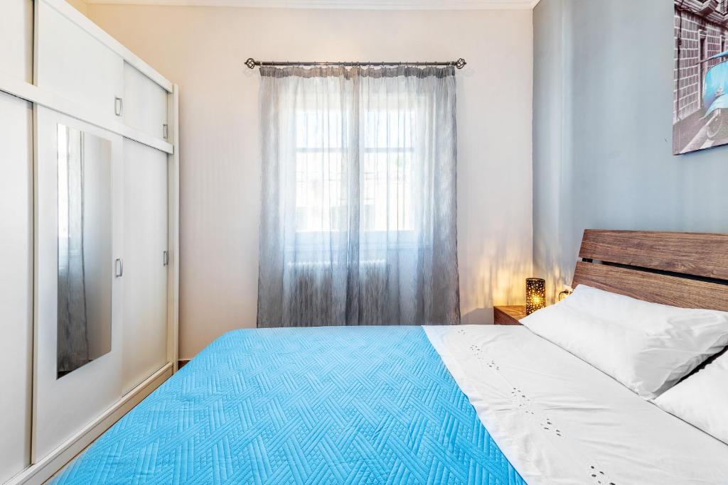 Postel nebo postele na pokoji v ubytování Casa Dapergola