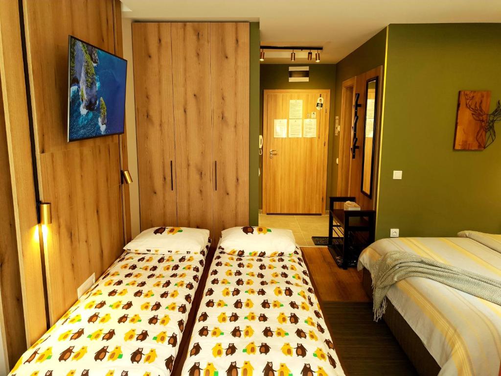 Postel nebo postele na pokoji v ubytování Pinewood ANG luxurious apartment A32