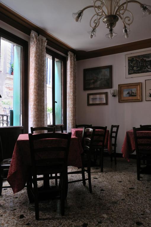 Posezení v ubytování Alloggi B&b Allegri