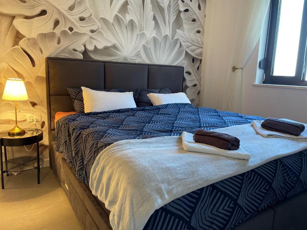 Posteľ alebo postele v izbe v ubytovaní Apartments Fortes Fortuna