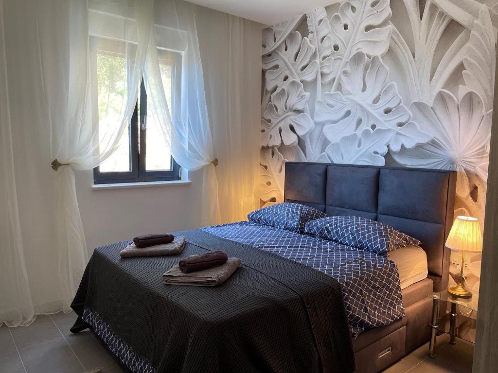 Posteľ alebo postele v izbe v ubytovaní Apartments Fortes Fortuna