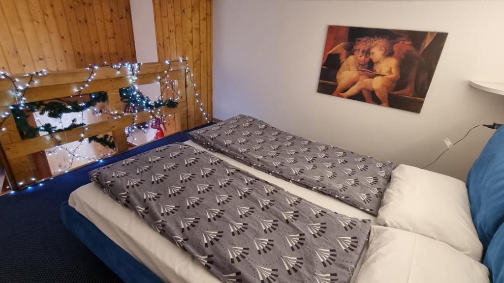 A bed or beds in a room at La Casa Degli Artisti - presso Sussy Residence