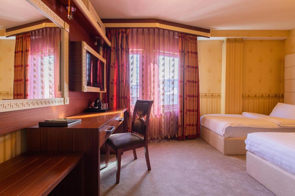 Postel nebo postele na pokoji v ubytování Hotel Afa