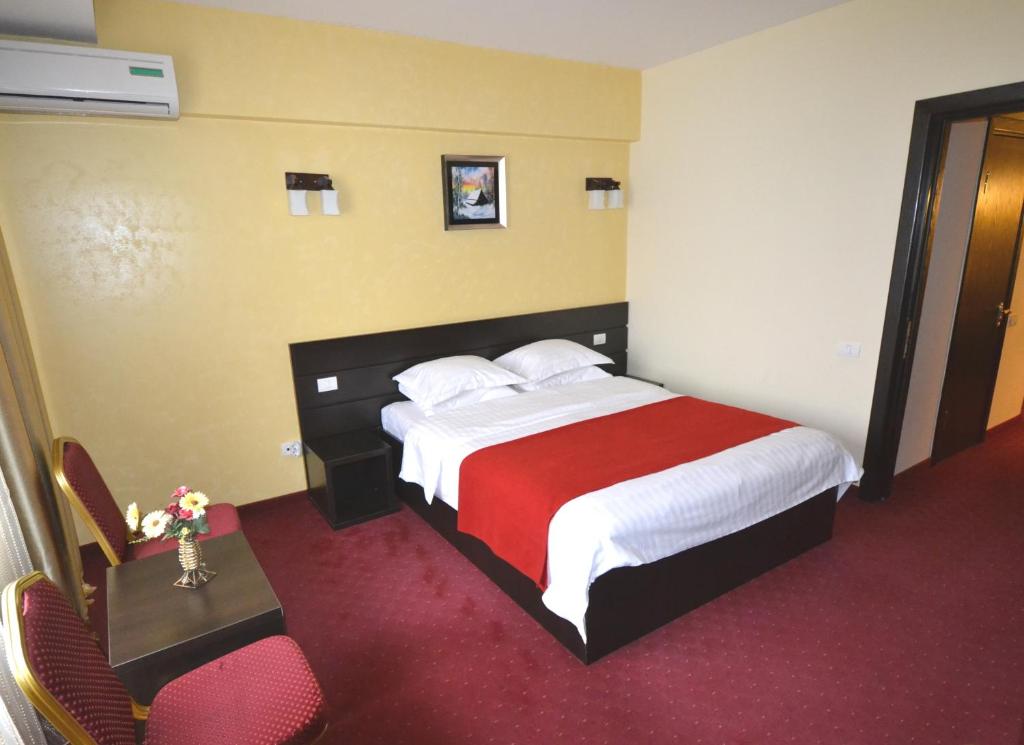 Postel nebo postele na pokoji v ubytování Hotel Ancor