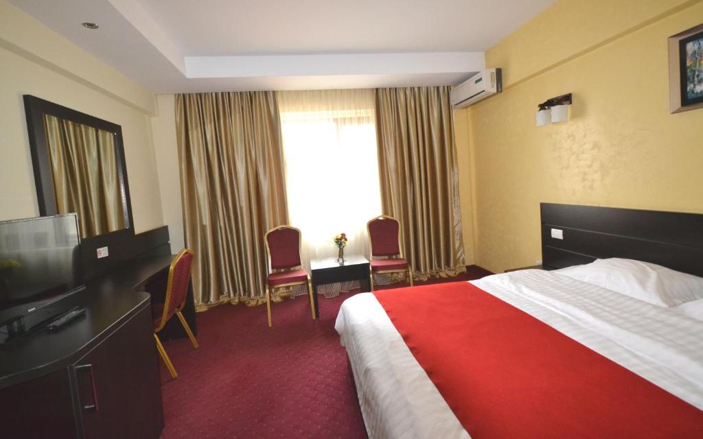 TV a/nebo společenská místnost v ubytování Hotel Ancor