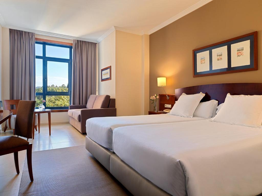 Кровать или кровати в номере Hotel Spa Galatea