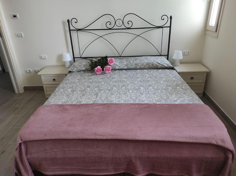 Łóżko lub łóżka w pokoju w obiekcie Affittacamere Villa Mary