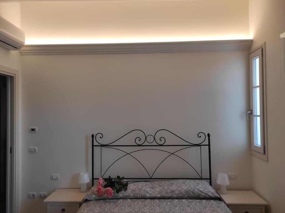 Łóżko lub łóżka w pokoju w obiekcie Affittacamere Villa Mary