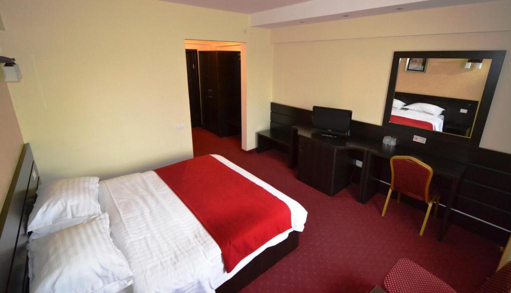 Postel nebo postele na pokoji v ubytování Hotel Ancor