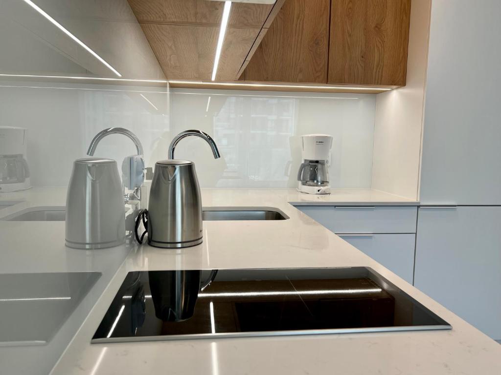 Kuchyň nebo kuchyňský kout v ubytování Apartamenty Angielska Grobla Q4Apartments