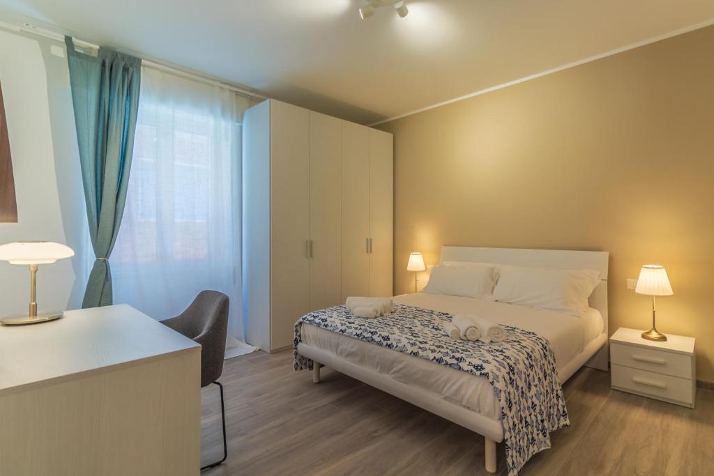 A bed or beds in a room at CASA VERA Tra storia, mare e comodità