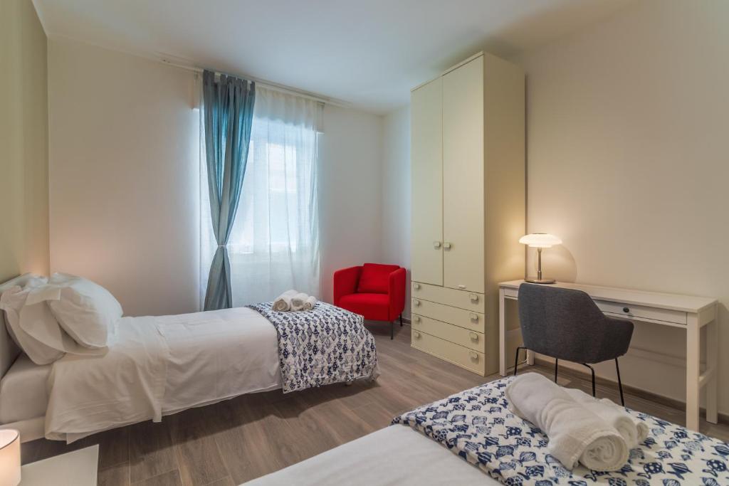 A bed or beds in a room at CASA VERA Tra storia, mare e comodità