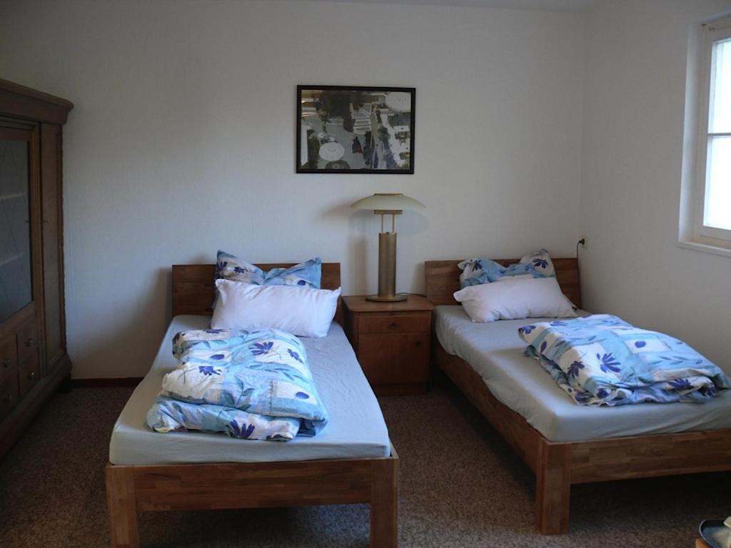 Apartments Weisser Reiter tesisinde bir odada yatak veya yataklar