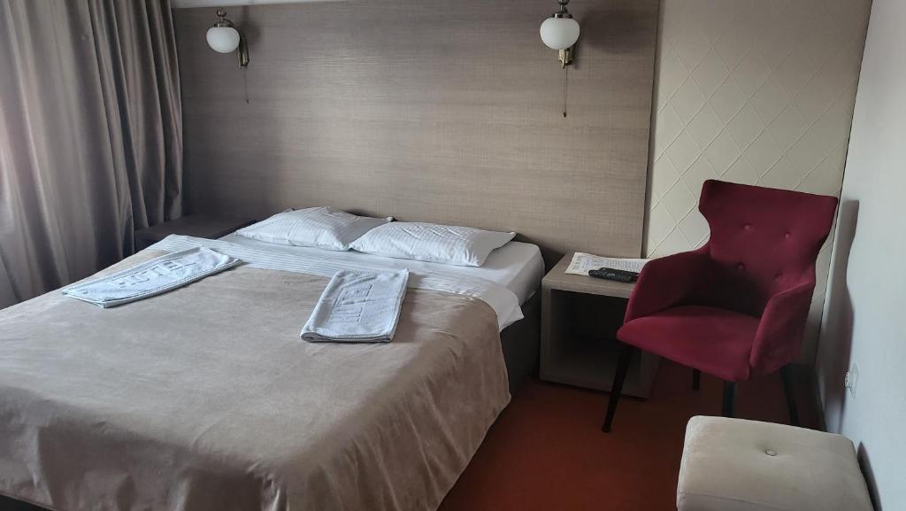 Postel nebo postele na pokoji v ubytování Hotel S