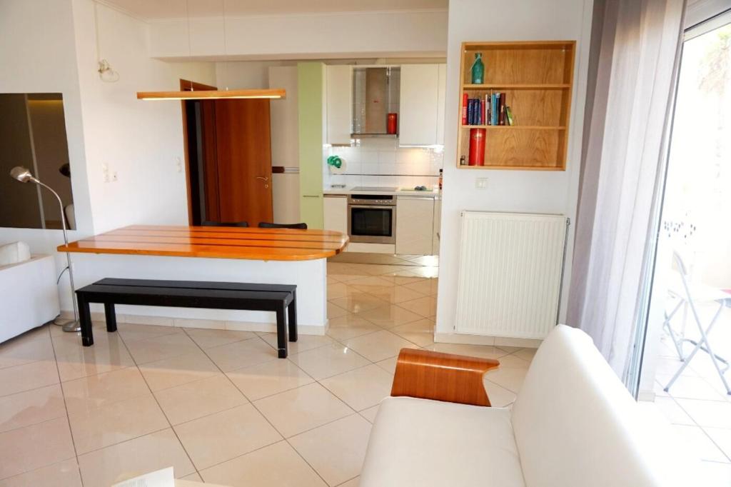 Kuchyň nebo kuchyňský kout v ubytování Piraeus Bright Apt