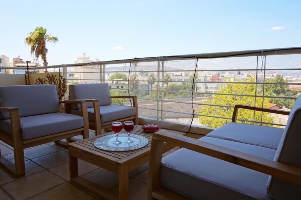 Balkón nebo terasa v ubytování Piraeus Bright Apt