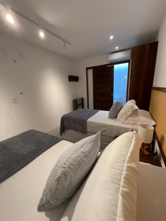 Postel nebo postele na pokoji v ubytování Cobertura Caju Rosa - Praia do Marceneiro-Milagres