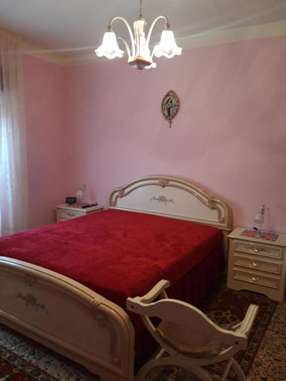 Katil atau katil-katil dalam bilik di casa vacanze zia Lina