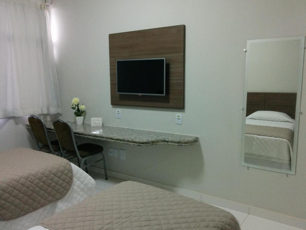 Postel nebo postele na pokoji v ubytování Itabuna Palace Hotel