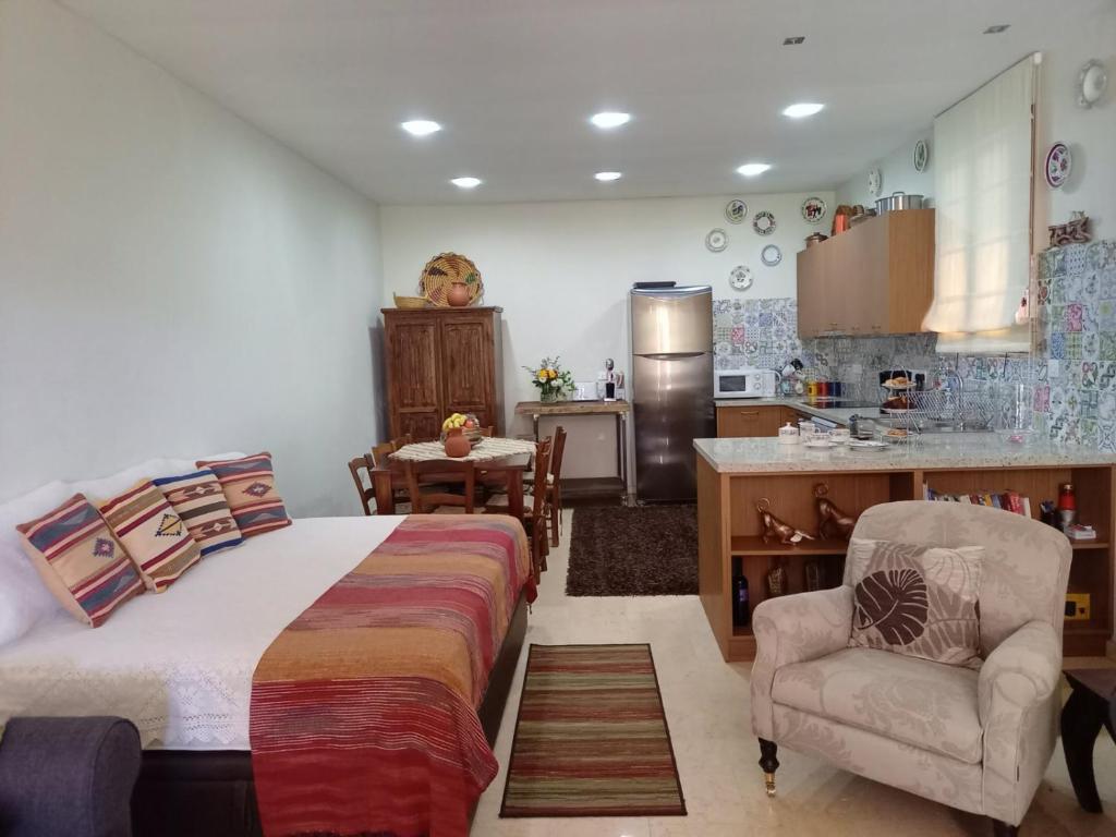 Katil atau katil-katil dalam bilik di Glykoharama Cottage