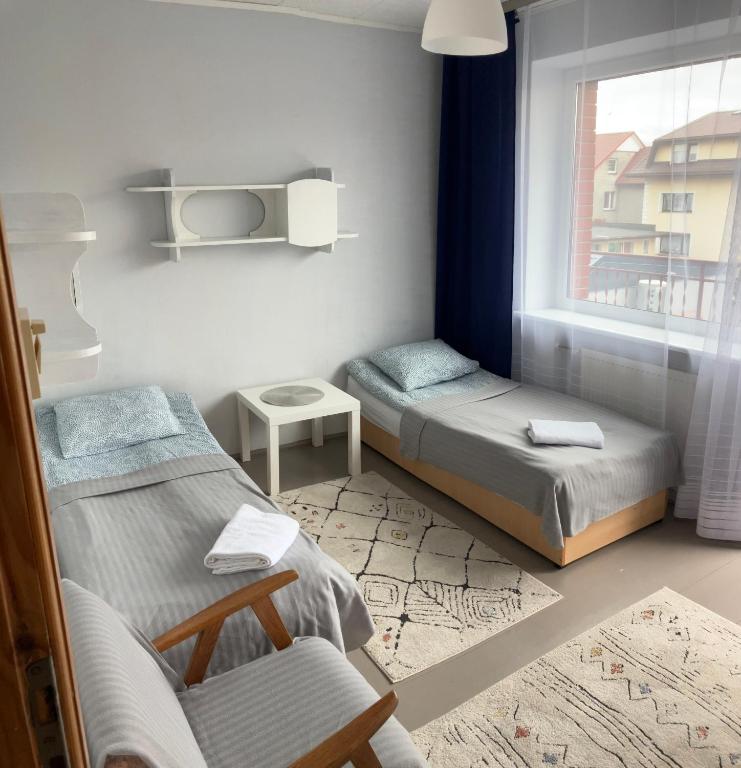 Postel nebo postele na pokoji v ubytování Prestige 2